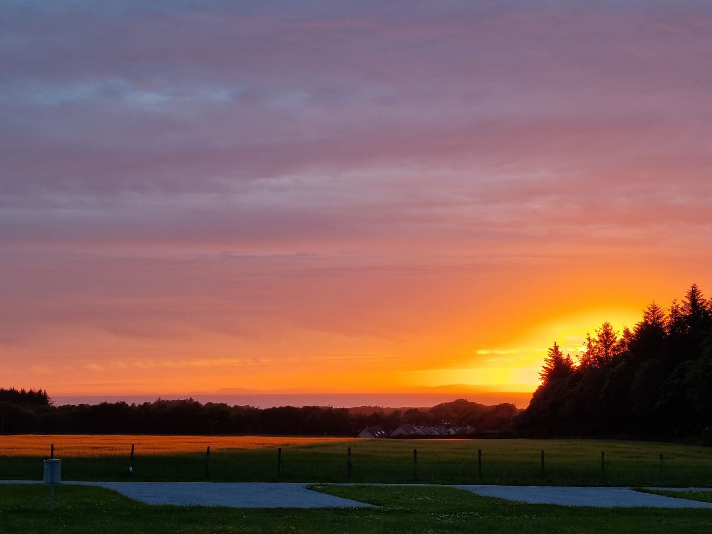 A June sunset over the fields