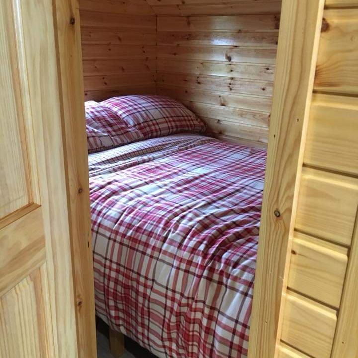 The small double bedroom inside a pod